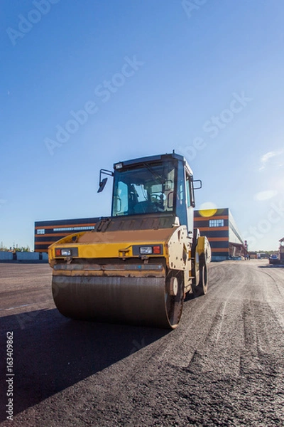 Obraz Work on asphalt paving on a sunny day	 
