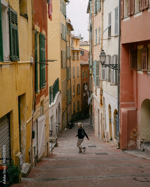 Obraz Charming Mediterranean Alley With Vibrant Pastel Buildings and Cobblestone Steps