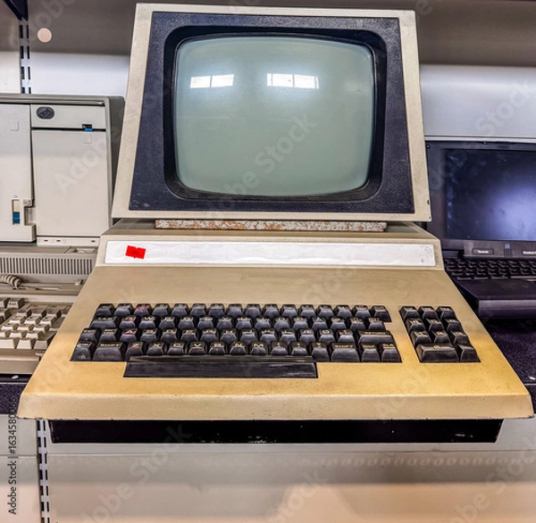 Fototapeta Retro computer monitor with keyboard in vintage technology exhibition. High quality photo