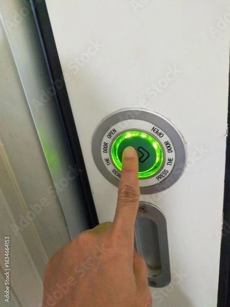 Obraz hand with switch on wall