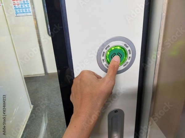 Obraz hand opening a door handle