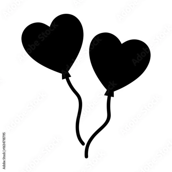 Fototapeta A pair of heart shaped balloons floating together in black and white