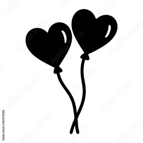 Fototapeta Two black heart shaped balloons floating gracefully in the air together