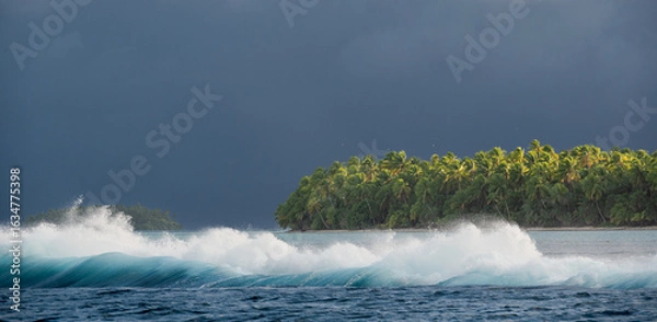 Fototapeta Storm approaching an Island while waves are crashing over the reef barrier