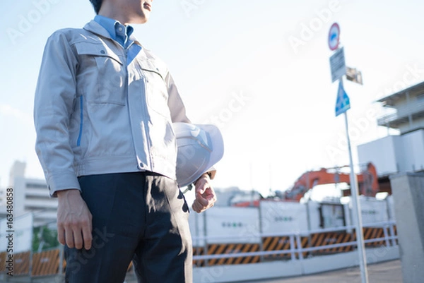 Fototapeta 工事現場にいる男性作業員