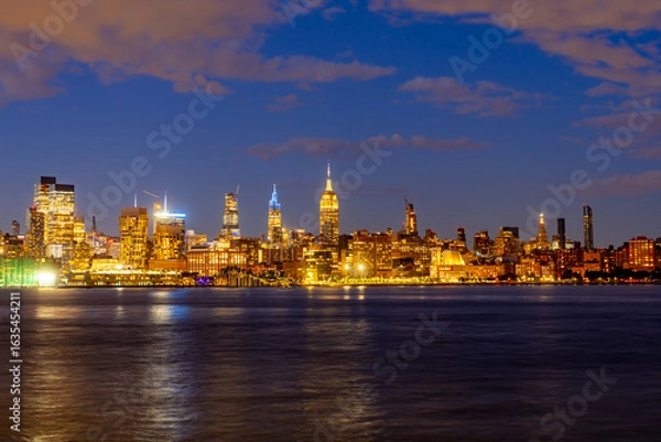 Fototapeta NYC, New York City Skyline with dramatic sky clouds. New York Skyscrapers. New York City skyline, cityscape of Manhattan in USA. Panoramic view on Manhattan. New York skyline. NYC, NY city.