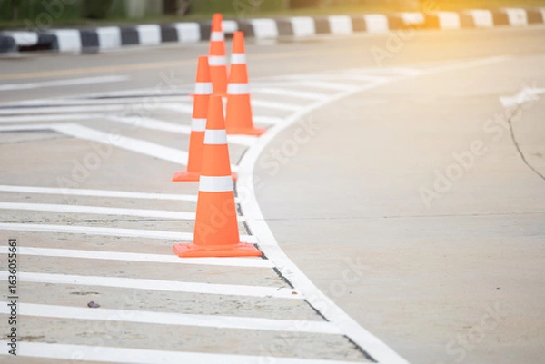Obraz Orange Traffic Cone on Empty Asphalt Road