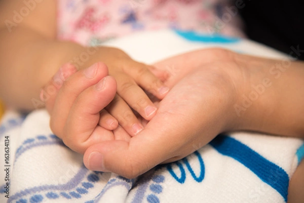 Fototapeta 小さな手