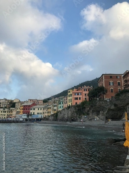 Obraz Distant mountains above the sparkling blue sea.
