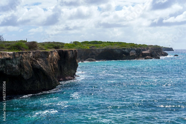 Fototapeta Paradise beach in Curaçao with crystal-clear waters and tropical vibes. Perfect for travel, luxury, lifestyle campaigns, and unforgettable experiences.