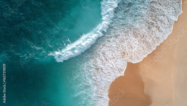 Fototapeta Aerial view of turquoise ocean waves crashing on a sandy beach water 1