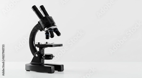 Fototapeta A Modern Black Microscope Isolated on a White Background for Science and Research