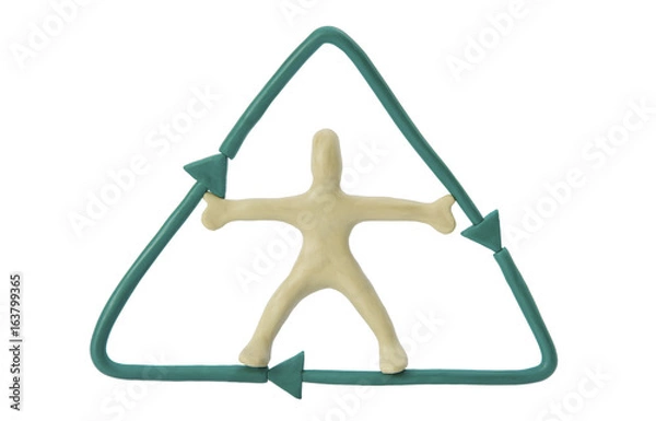 Fototapeta A little man from plasticine and a sign of ecology