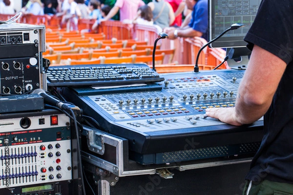 Obraz Man using a mixing console in live concert