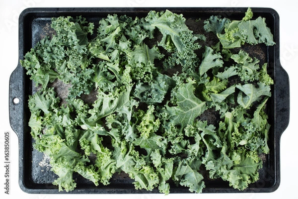 Fototapeta Kale on a cookie sheet