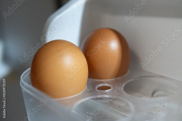 Obraz eggs in a plastic container