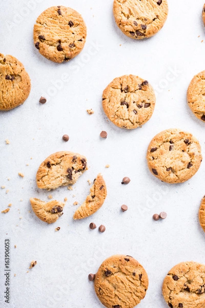 Fototapeta Background with chocolate chip cookies. Flat lay. Top view.