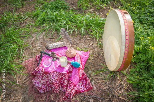 Fototapeta Altar and drum with drumstick and symbols of essential elements
