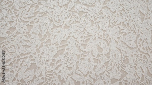 Fototapeta Ivory lace textile displayed against a plain backdrop