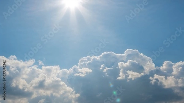 Obraz Pastel blue sky with blurred sun rays at dawn