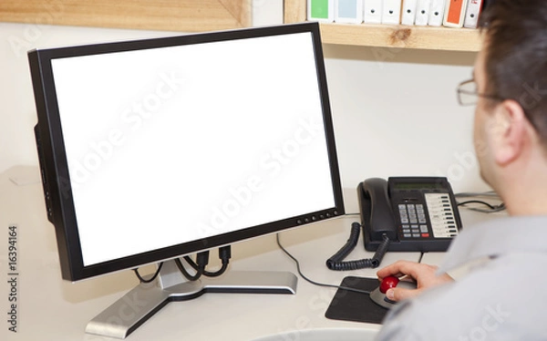 Fototapeta man working on a computer