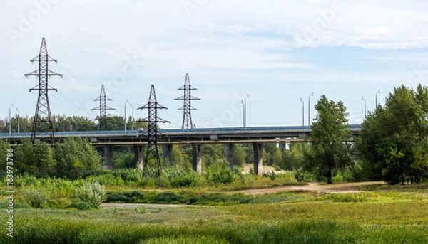 Obraz Road bridge passing through the field