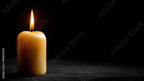 Obraz Single burning candle on dark background for relaxation and ambiance