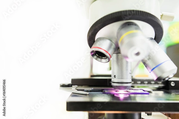 Obraz Microscope in the laboratory which use for detect the objects that are too small for the naked eye.Picture for concept such as hospital, doctor, medical equipment, health and science.
