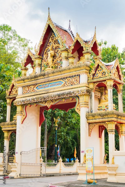 Fototapeta Trang, Thailand , July 11,2017: The entrance to the ancient temple This is the temple of Buddhist monks living in Buddhism. It is one of the famous temples of Thailand.