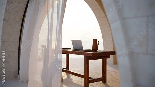 Obraz Serene outdoor workspace: laptop, rustic wooden table, flowing curtains, sunlit minimalist architecture.