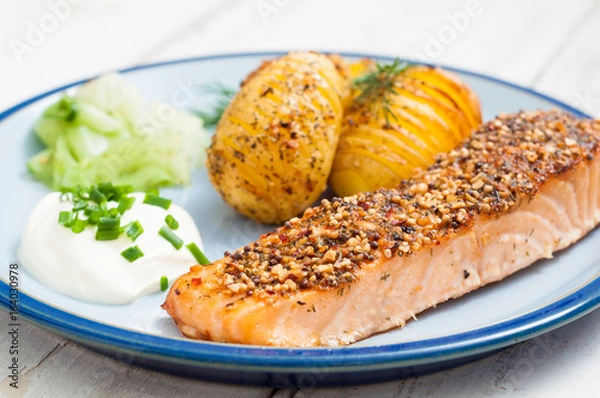 Obraz Scandinavian salmon with potatoes and pickled cucumber.