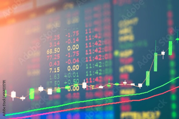 Fototapeta candle graph of stock market double exposure business concept