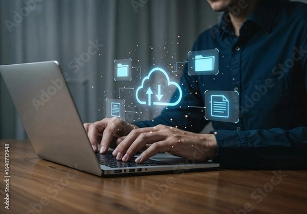 Fototapeta Man using laptop, cloud computing, data transfer, digital files, modern technology, professional, serious mood, nighttime setting.