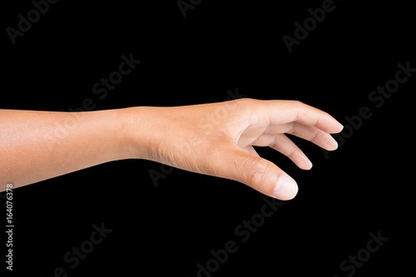 Fototapeta left side hand of a man trying to reach or grab something. fling, touch sign. Reaching out to the left. isolated on black background