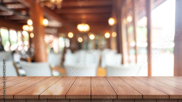 Fototapeta 	
Empty wooden table top with lights bokeh on blur restaurant background.