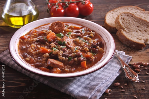 Obraz Ricet - barley and bean soup with sausage
