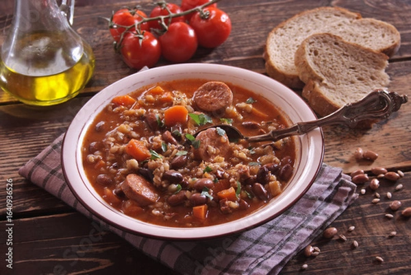 Obraz Ricet - barley and bean soup with sausage
