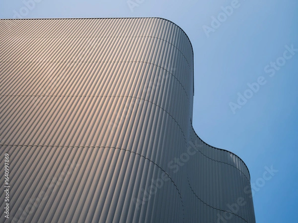 Fototapeta Architecture details Curve facade Modern building exterior shade lighting pleat texture 