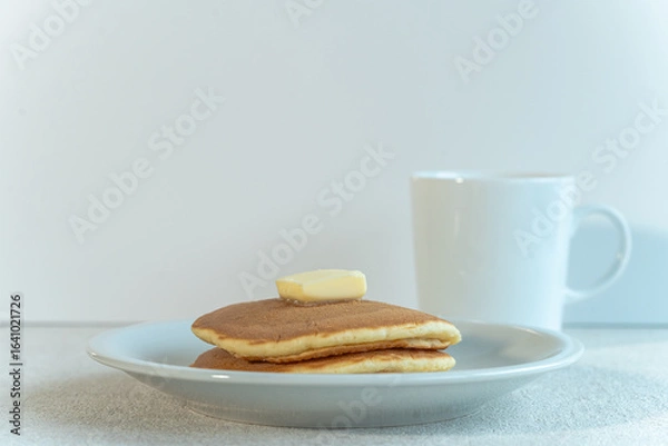 Obraz 白い食器とホットケーキとコピースペース