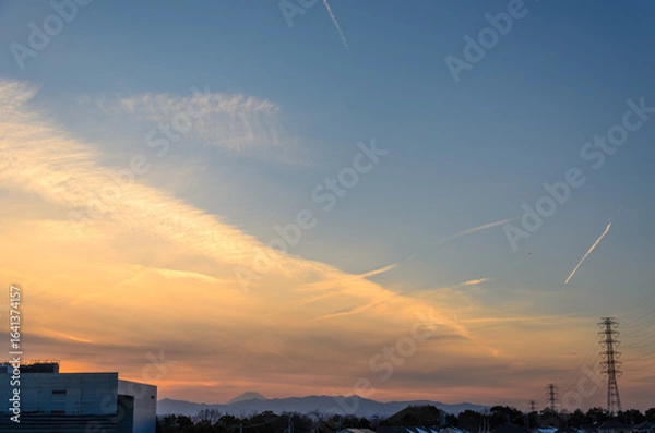 Fototapeta 夕日に染まる雲
