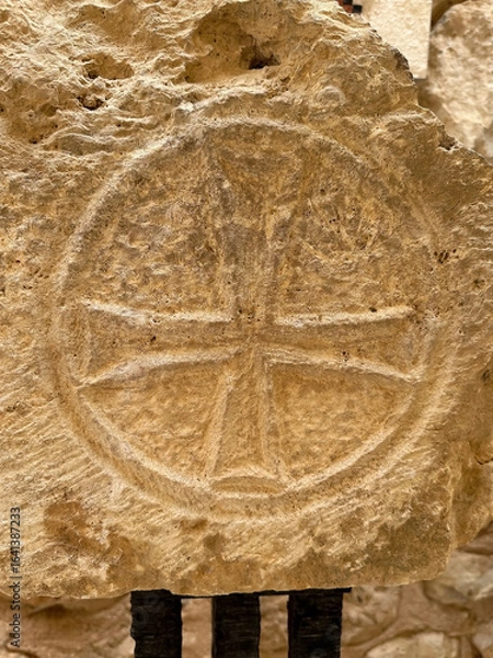 Fototapeta Symbol in the new church protecting the excaveted church remains at Mount Nebo, an elevated ridge in Jordan