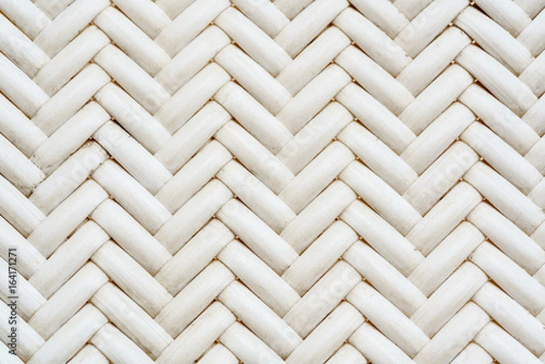 Obraz Close up synthetic white rattan weaving the seat of a chair