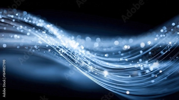 Fototapeta Abstract Blue Light Trails Flowing with Sparkling Particles on Dark Background, Modern Technology Design