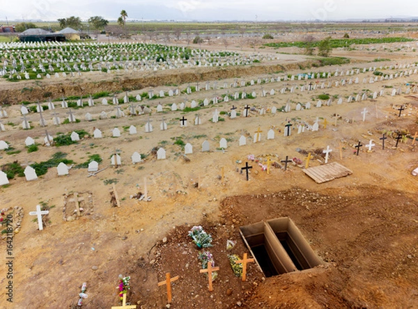 Obraz Aerial of cemetery with open grave