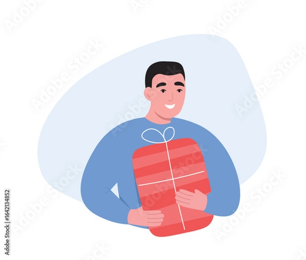 Fototapeta A smiling man holding a gift box. Vector flat graphics.