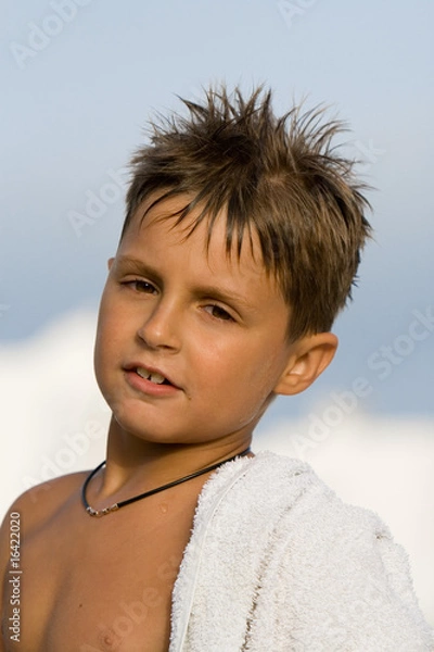 Obraz smiling boy in beach towel
