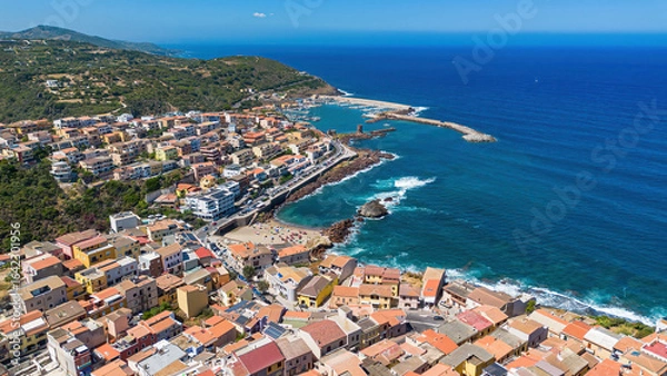Fototapeta Aerial view of marina of Castelsardo, a fortified Genoese city built on a headland overlooking the Mediterranean Sea on the Italian island of Sardinia