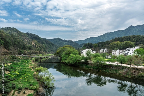 Fototapeta A small mountain village by the riverside in the water towns of Jiangnan, China