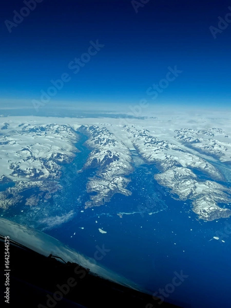 Fototapeta an aerial view of Greenland and it ice pack.