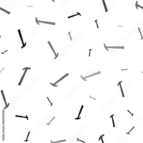 Fototapeta Seamless vector pattern with hammer symbols, creating a creative monochrome background with rotated elements. Illustration on transparent background